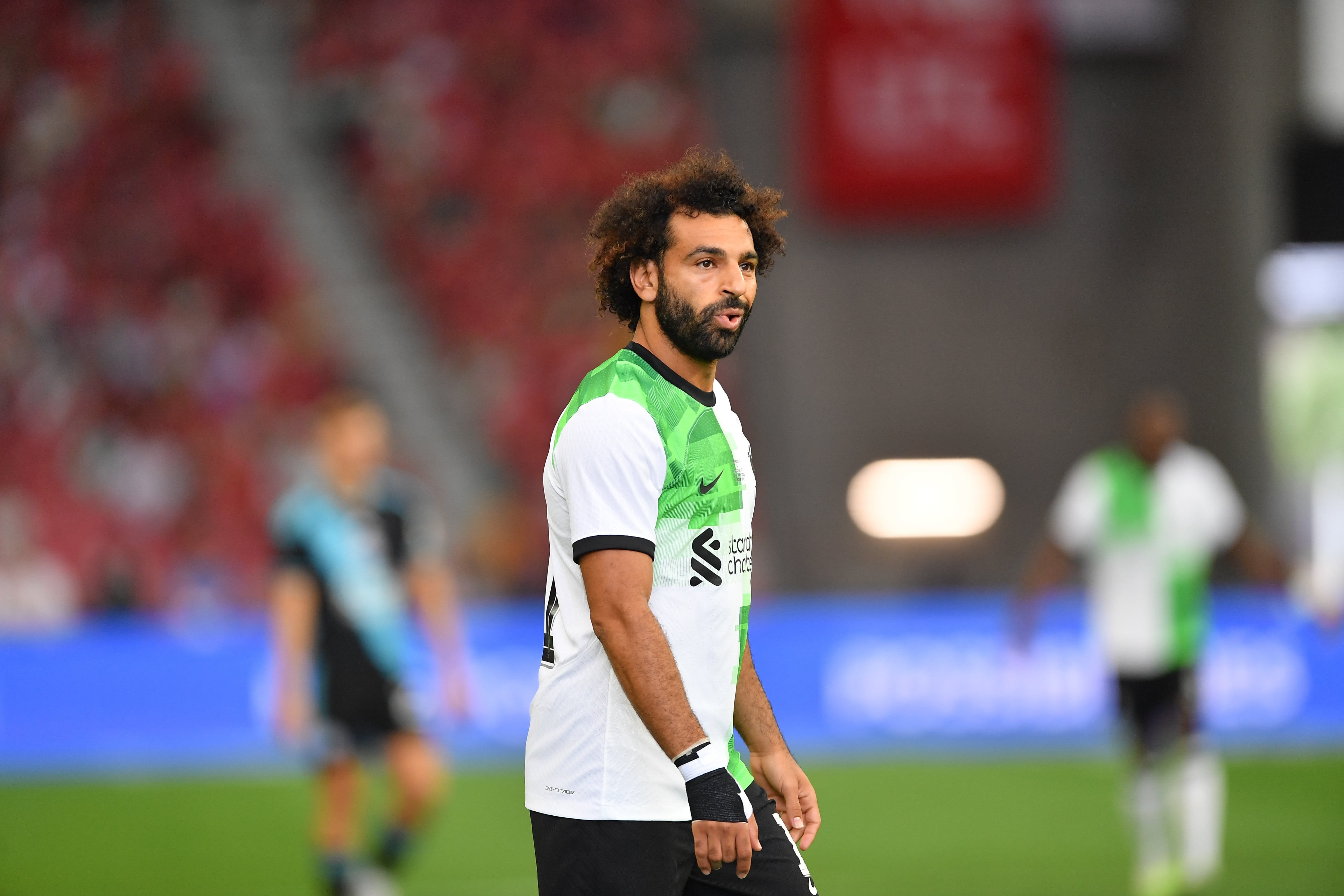 Mo Salah reacts to touchline argument with Klopp